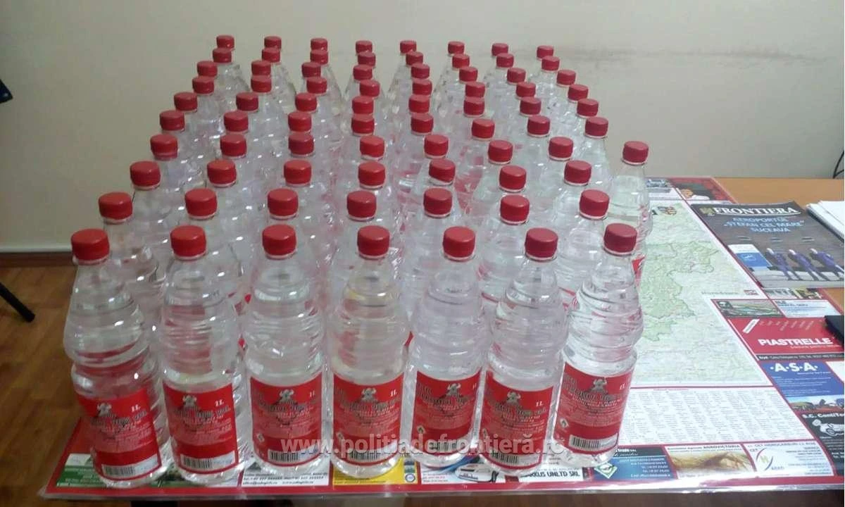 77 de sticle cu alcool etilic ascunse într-un autoturism, descoperite de poliţiştii de frontieră arădeni