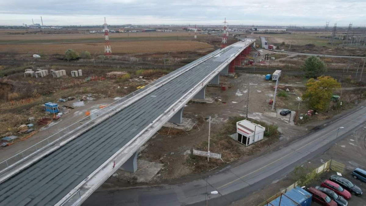 A început turnarea asfaltului pe noul pasaj din Micălaca