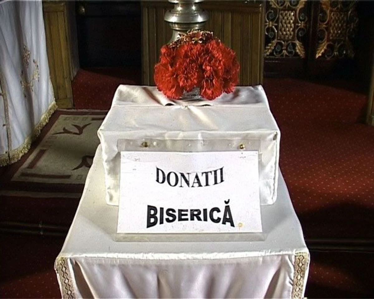 DOI PREOTI S-AU LUAT LA BATAIE, IN BISERICA, DIN CAUZA BANILOR