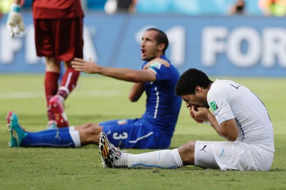 FOTBAL - CM 2014: LUIS SUAREZ, SUSPENDAT 9 MECIURI SI 4 LUNI IN AFARA FOTBALULUI!