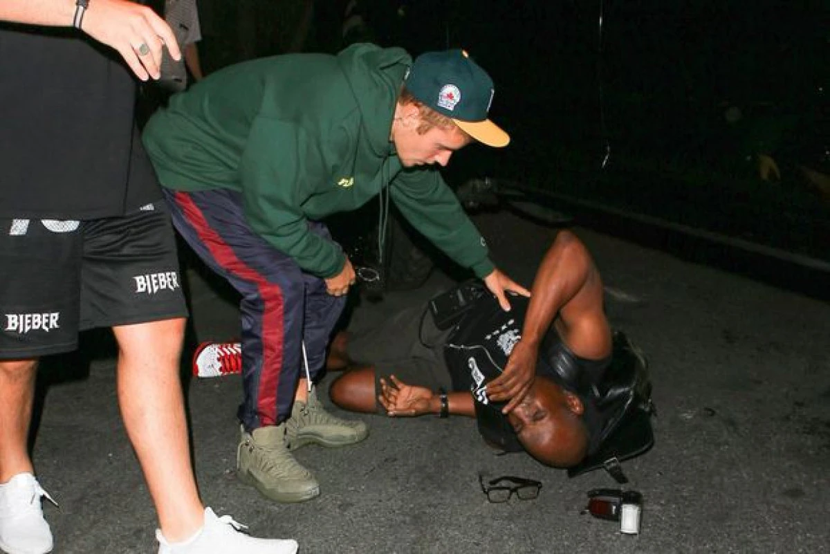 Justin Bieber a lovit cu mașina un fotograf