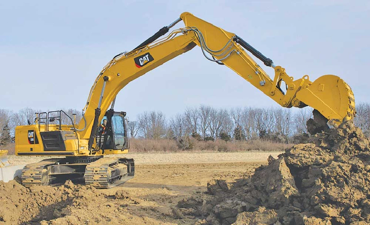 Mort de beat, la volanul unui excavator