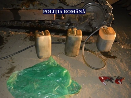 Doi bărbați, prinși după ce au furat combustibil dintr-un buldozer