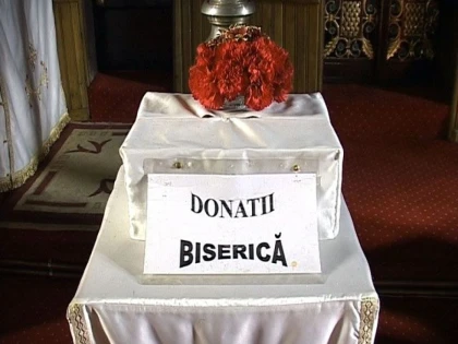 DOI PREOTI S-AU LUAT LA BATAIE, IN BISERICA, DIN CAUZA BANILOR