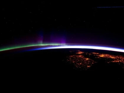 Imaginea săptămânii vine de la NASA. Aurora boreală văzută din spațiu