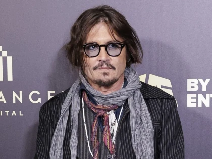 Johnny Depp a semnat un contract record, în valoare de 20 de milioane de dolari, cu casa Dior
