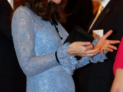 Kate și-a arătat burtica de gravidă