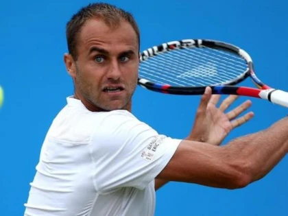 Marius Copil, eliminat pe iarba de la All England Club