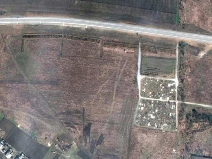 O a treia groapă comună a fost descoperită lângă Mariupol