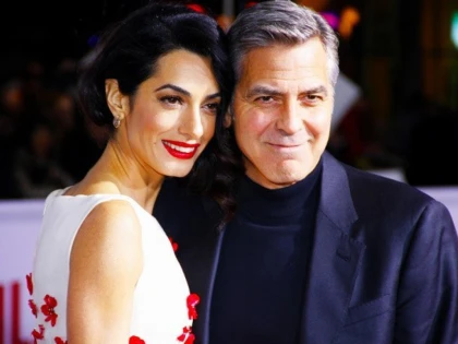 Pentru ce au donat George și Amal Clooney 500.000 de dolari