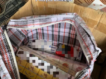 Percheziții la Șiria: polițiștii au găsit sute de litri de alcool și țigări de contrabandă