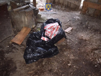 Soț și soție din Vârfurile, prinși cu țigări de contrabandă și armă