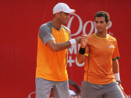 TECAU SI ROJER S-AU CALIFICAT DRAMATIC IN FINALA DE LA WIMBLEDON
