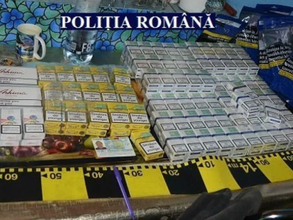 Țigări de contrabandă, descoperite în urma unor percheziții domicilare la Zărand