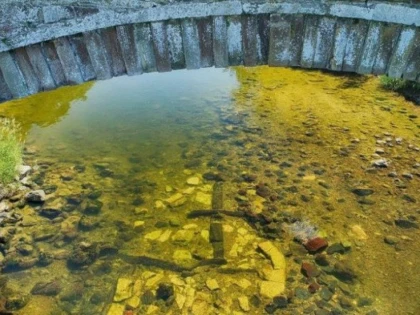 Un pod din anii 1300, descoperit de arheologi pe fundul unui râu din Scoția